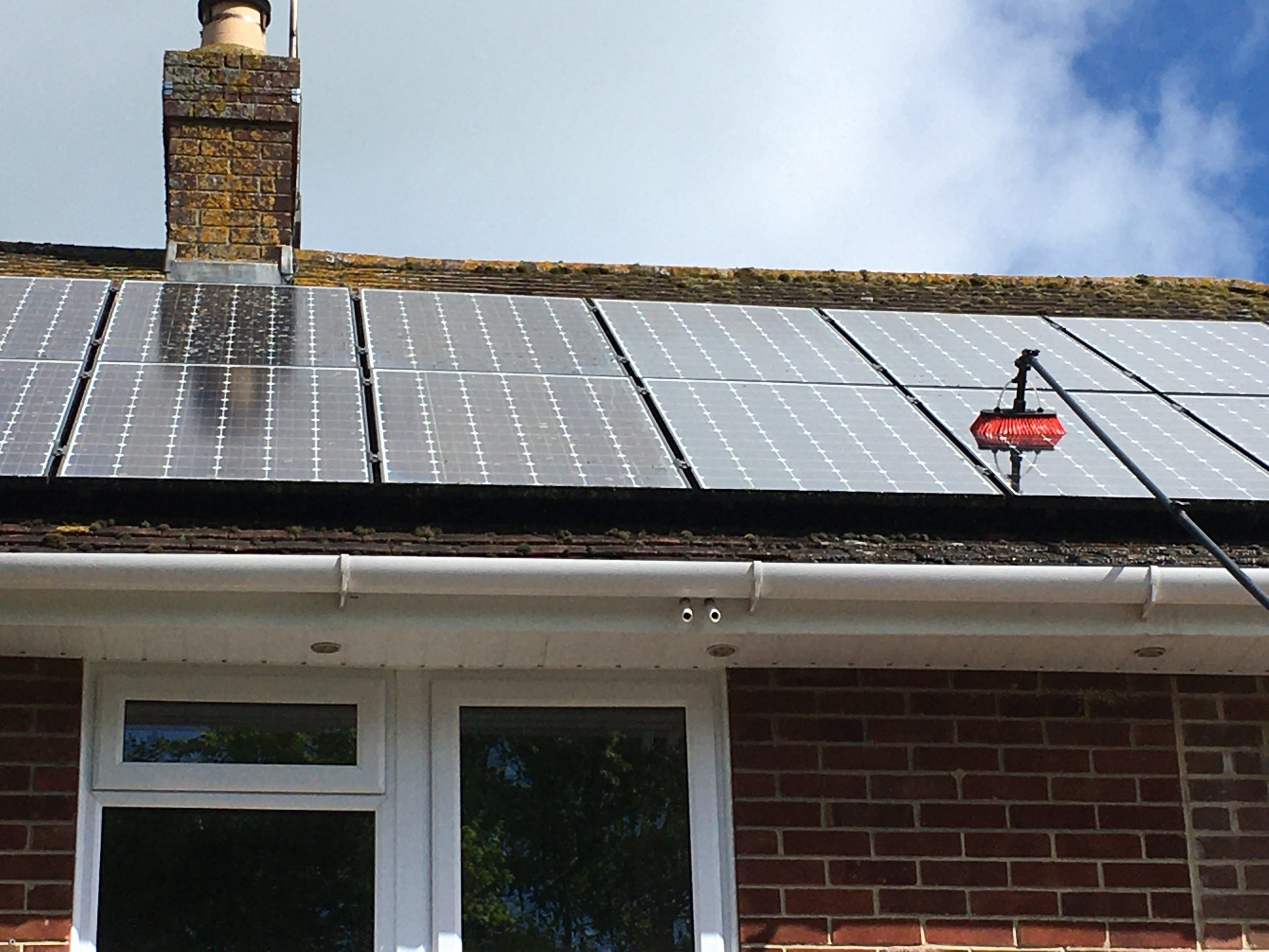 Residential solar array being cleaned in Northfields in Devizes, Wiltshire